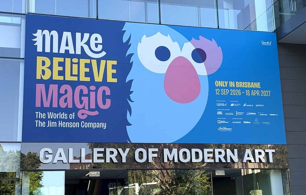 Entrance to GOMA in Brisbane with Make, Believe, Magic: The Worlds of The Jim Henson Company exhibition signage