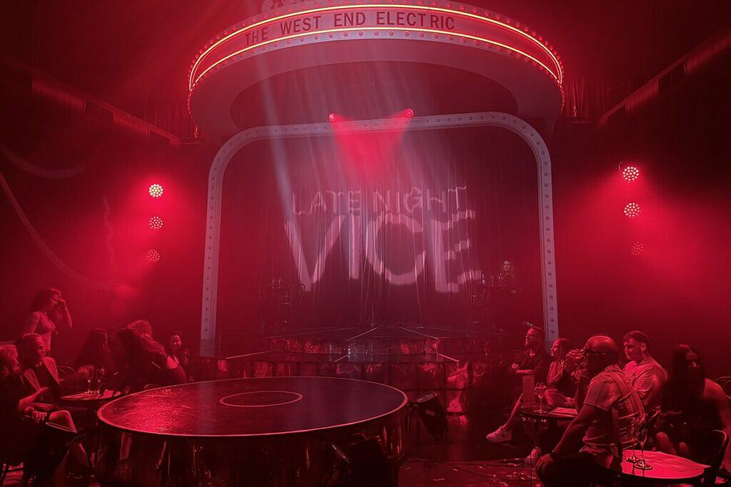 The West End Electric theatre illuminated in red before Late Night Vice in Brisbane